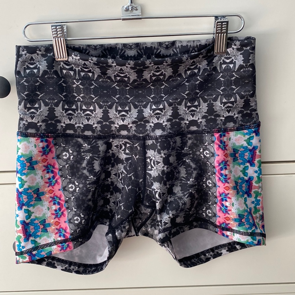 S Prana Baja athletic shorts in black and white with multicolored sides.